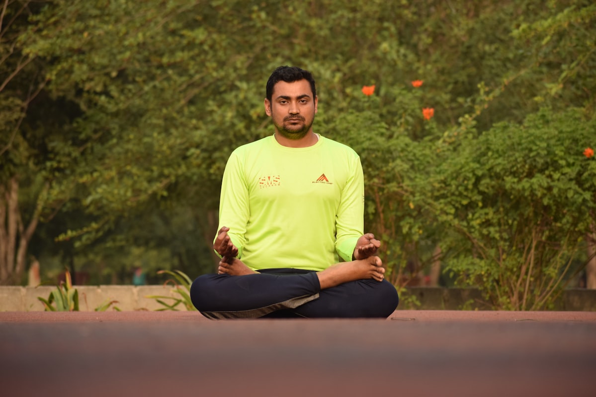 Man practicing yoga poses